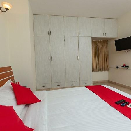 Oyo 23202 Cute Orange Service Apartments Csennai Kültér fotó